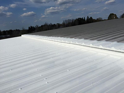 Top of a commercial metal roof repair in San Antonio Texas