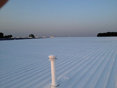 Commercial metal roof restoration in Beaumont Texas