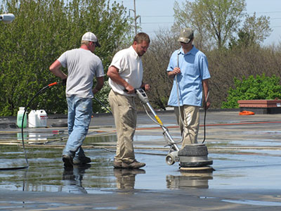 Commercial roof cleaning in progress