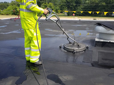 Cleaning a commercial roof in Houston, Texas