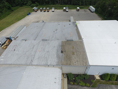 Commercial roof in need of professional cleaning