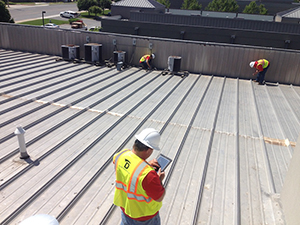 Team performing commercial roof inspections in Pasadena, Texas