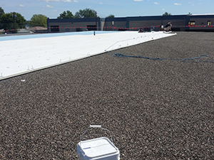 New coating on gravel roof