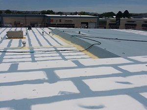 Coating applied by BUR roofing experts