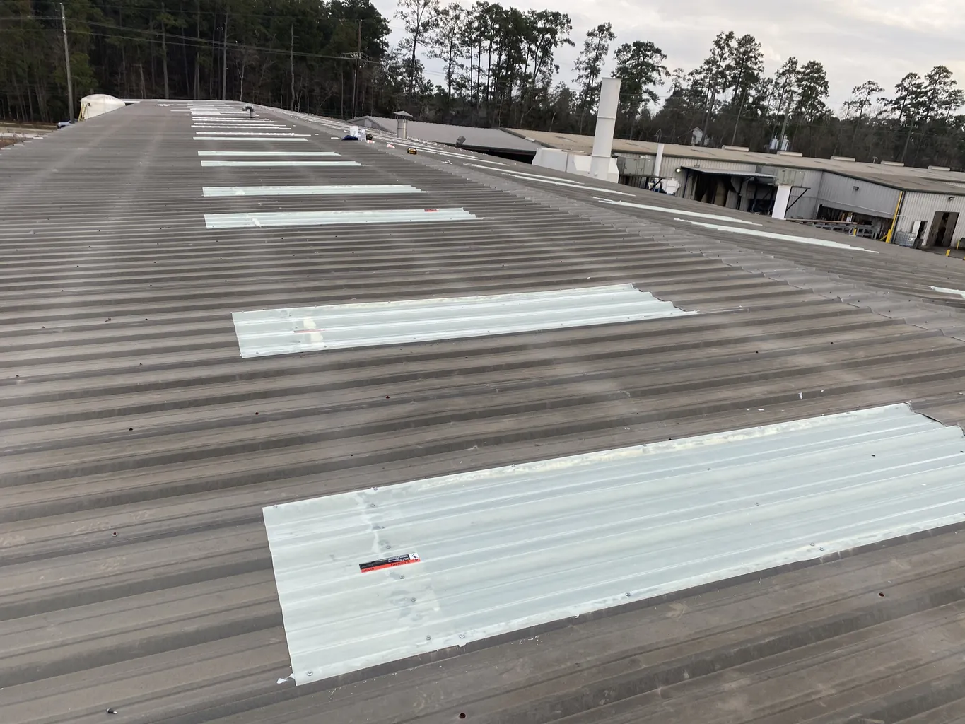 Commercial Metal Roof Restoration In Baytown, TX Commercial Roof Repair Solutions Houston, TX