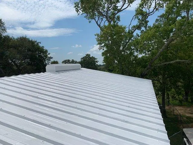 Acrylic coating on a metal roof